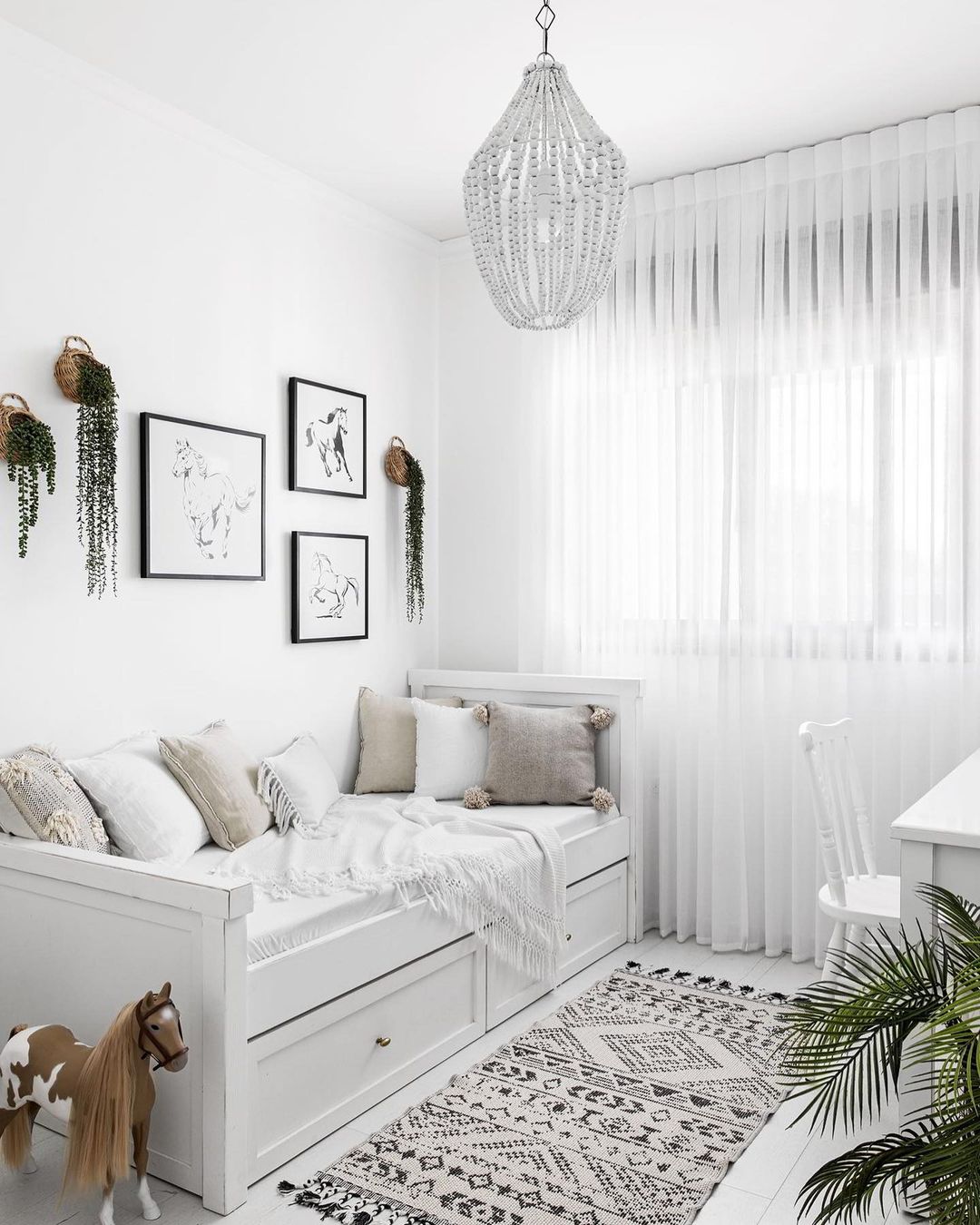 Playful White Bedroom with Boho Touches