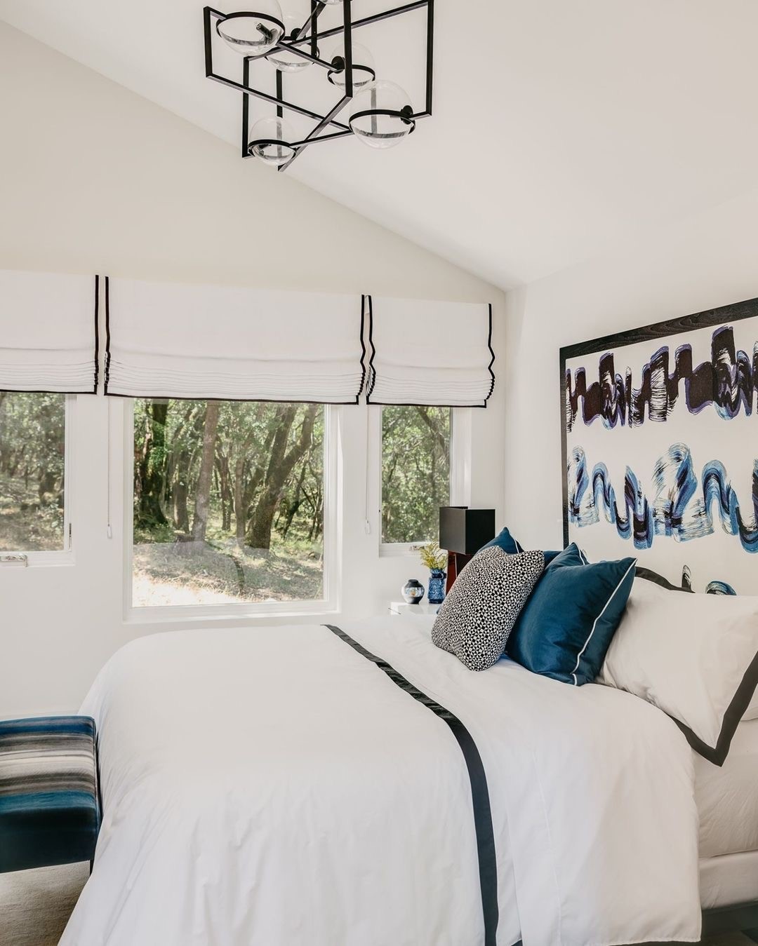  Modern White Bedroom with Bold Blue Accents