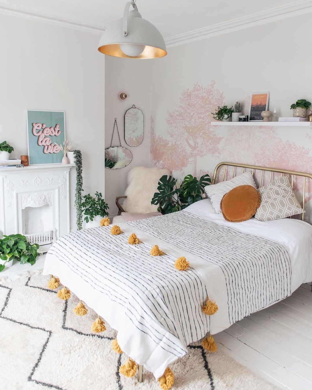 Eclectic White Bedroom with Playful Pops