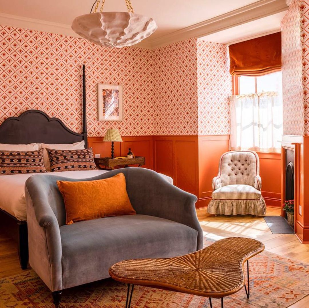 Vintage Wallpaper With Bold Orange Accents