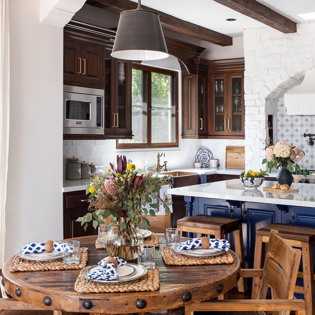  Dark wood and blue Spanish kitchen