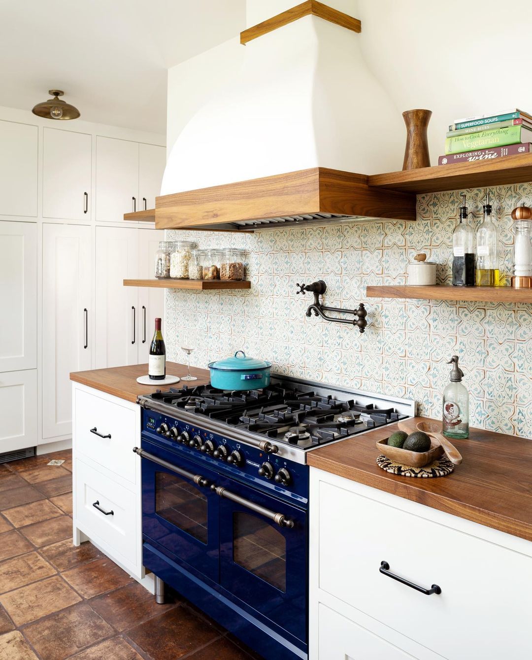 Bold blue range in Spanish kitchen