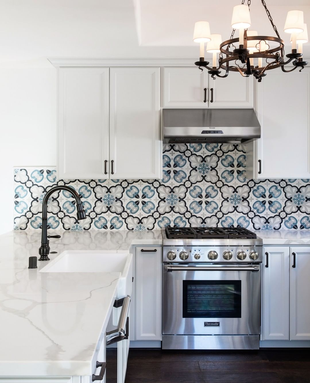 Patterned backsplash in elegant Spanish Kitchen Interior Design