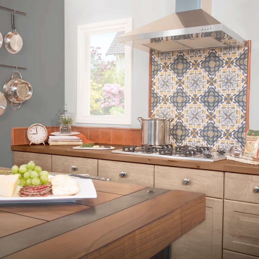 Bold tiles and terracotta Spanish kitchen.