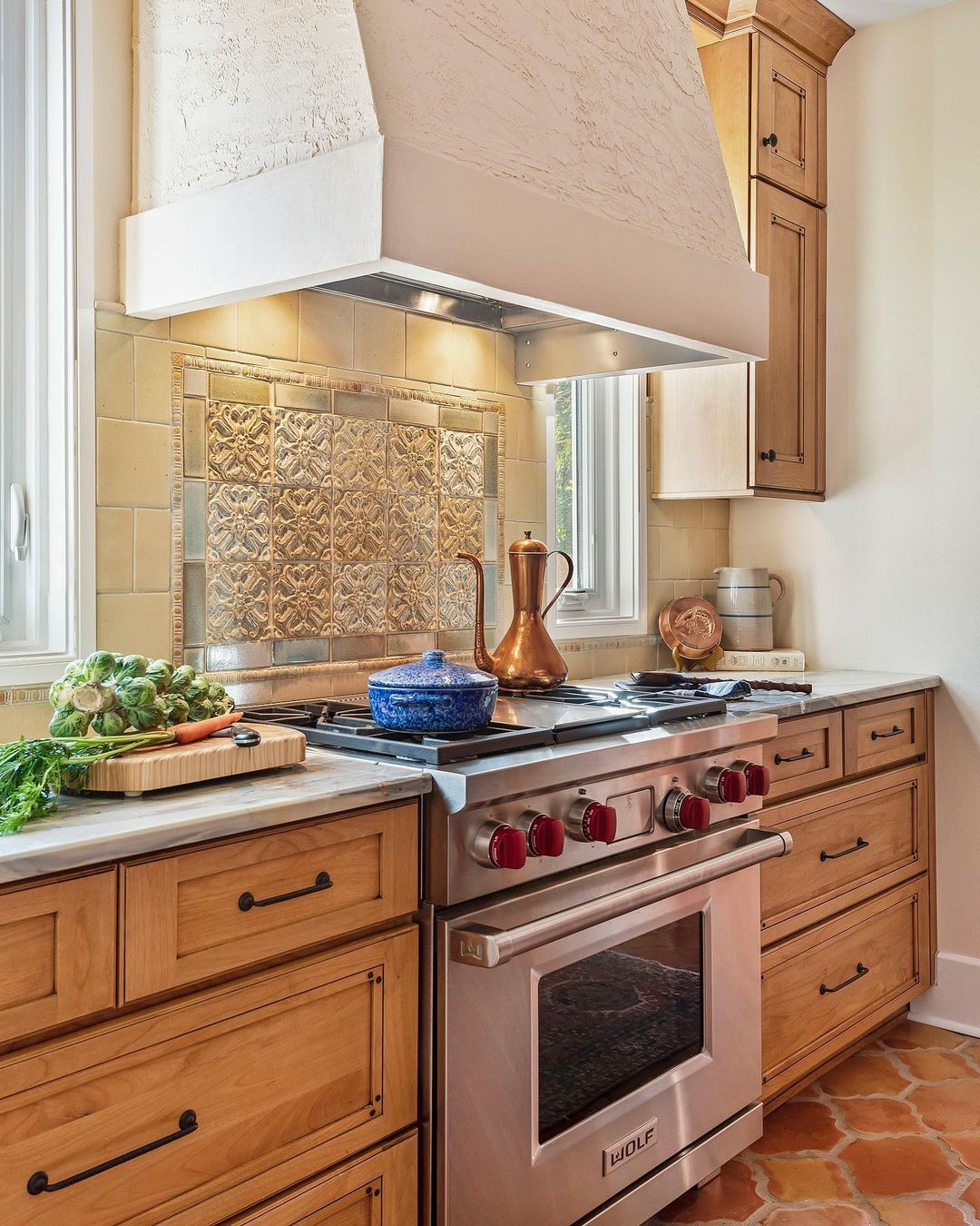 Spanish kitchen with ornate tile accents