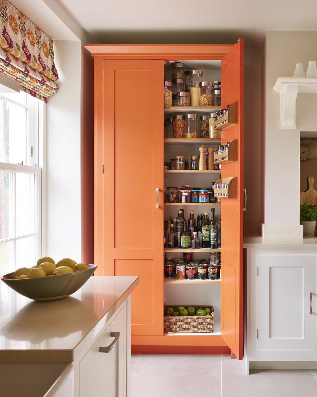 Warm Orange Pantry With Cozy Charm