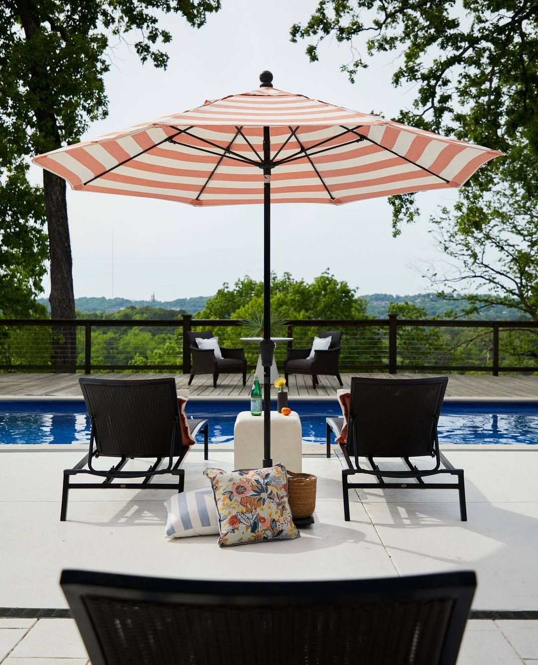 Striped Umbrella For Playful Poolside Charm