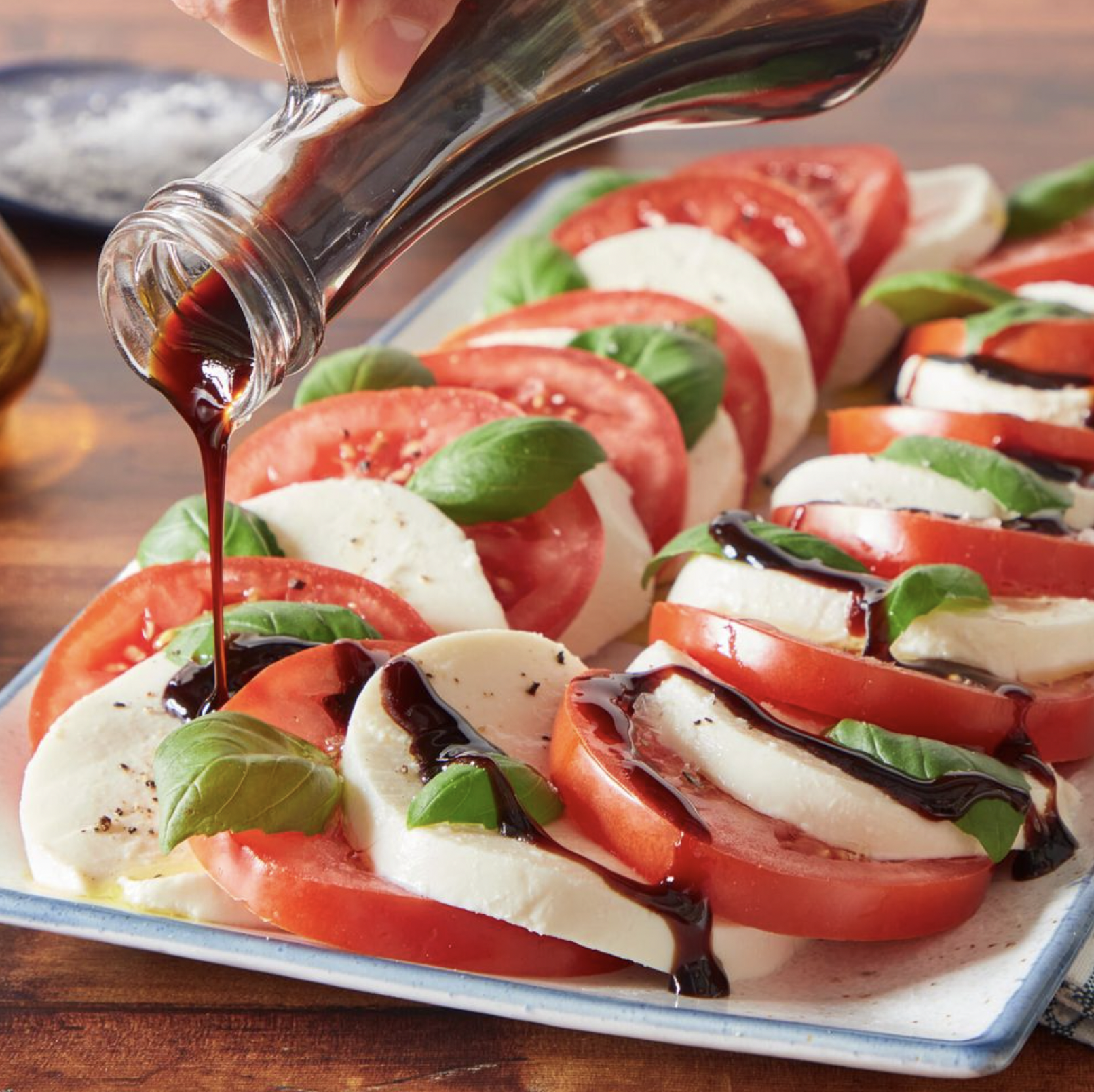 Sliced Tomatoes And Fresh Mozzarella Cheese Caprese Salad