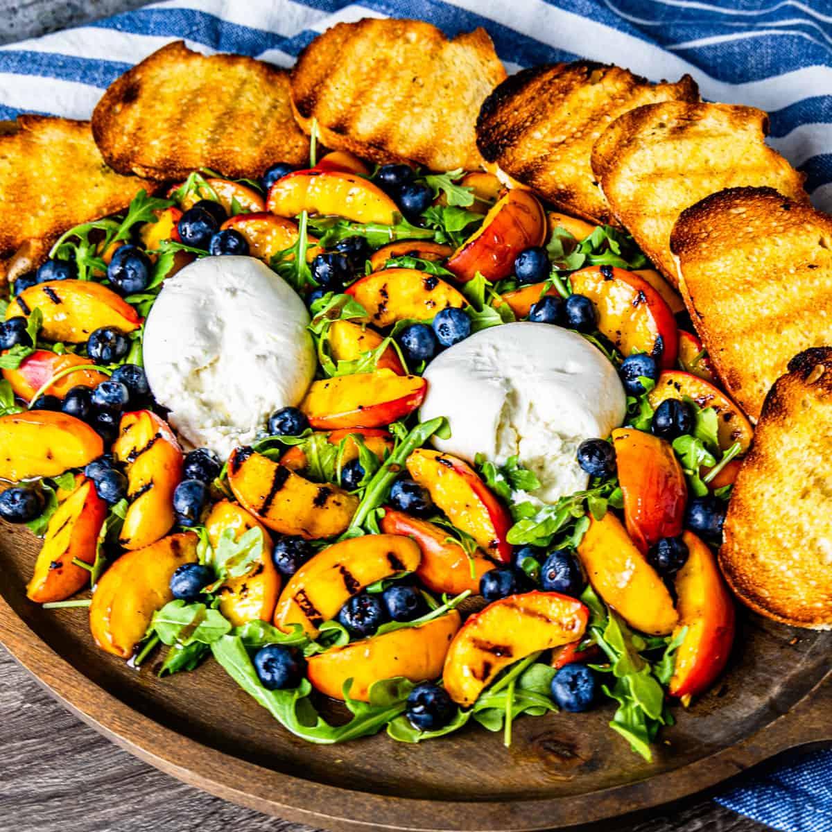 Grilled Peach and Burrata Salad with Arugula and Blueberries