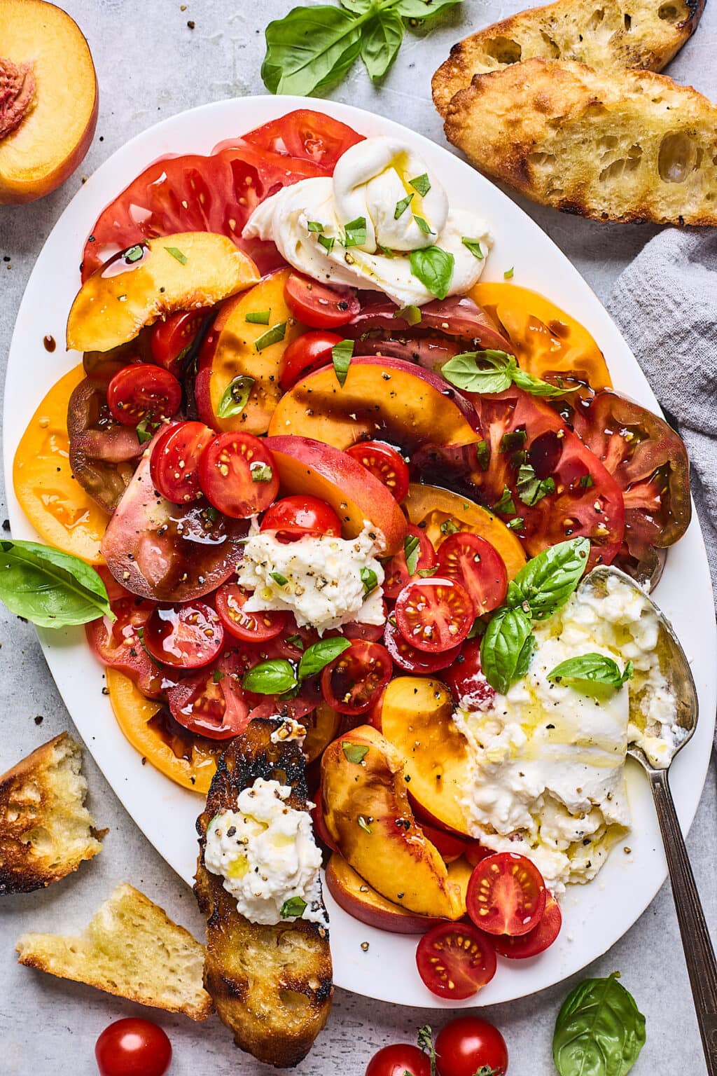 Tomato and Peach Burrata Salad with Balsamic Glaze and Fresh Basil