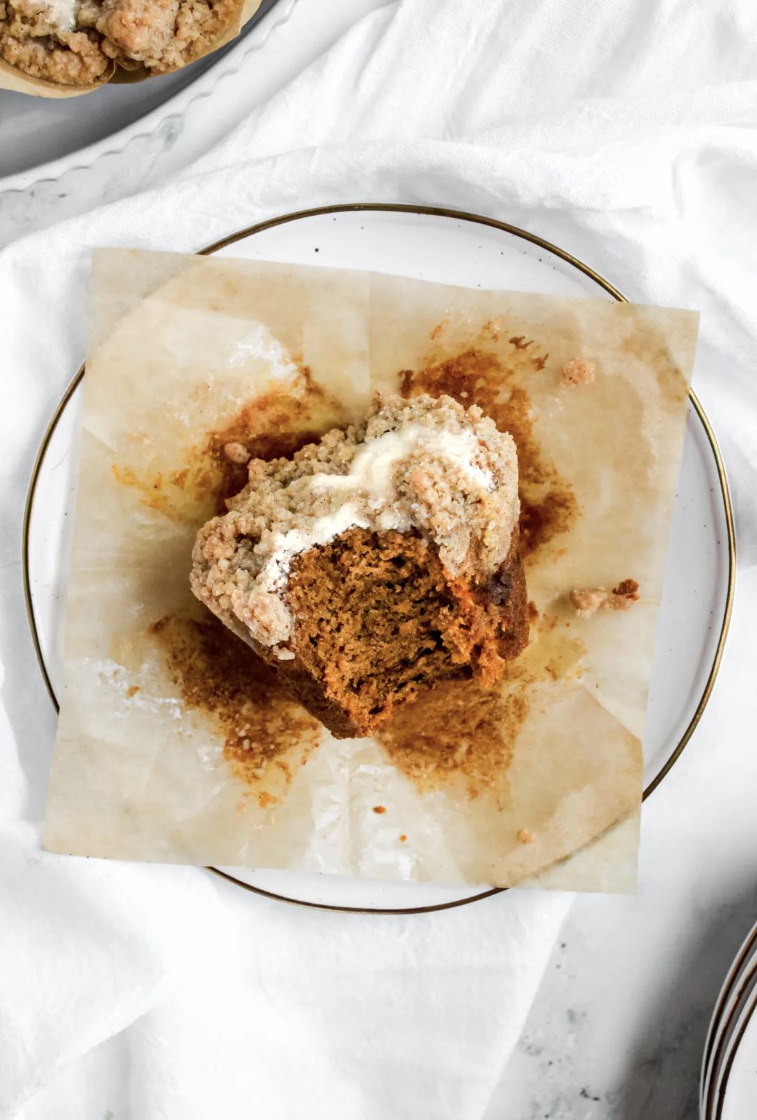 Pumpkin Cheesecake Muffins with Cinnamon Crumble